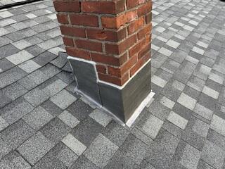 New Flashing Is Installed Around the Chimney