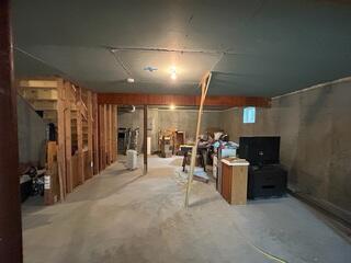 Here is what the basement walls looked like before we installed our insulated Basement to Beautiful panels. Concrete walls like the ones pictured here do not help to keep the basement feeling warm and cozy.
