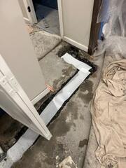 WaterGuard was installed around the perimeter of the basement, directing any seeping water from the walls and floors to the sump pump for removal.