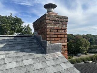 New Flashing Is Installed on the Chimney