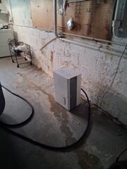 This basement was letting in so much water that the customer's dehumidifier was not effective.