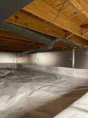With the SilverGlo and cactus board installed, the CleanSpace liner is then installed over top to seal and completely isolate the crawl space from the ground.