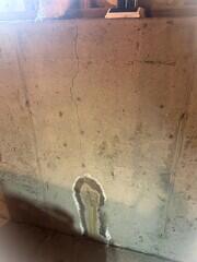 Upon inspection, our specialist documented this crack that was in the wall. Water had made its way through and left behind a white, chalky stain after it had evaporated off the concrete.