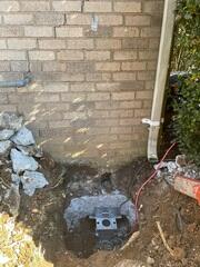 Five push piers were used to lift up a settled corner of the home.