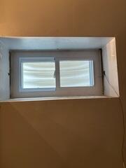 The Everlast Window Insert was installed to keep out drafts and moisture from leaking into the basement.