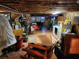 Persistent water intrusion through cold joints during rainstorms caused repeated basement flooding, resulting in significant damage such as ruined carpeting, compromised flooring, and stored belongings at risk. Frequent use of a shop vac was required to remove standing water, highlighting the severity of the issue.