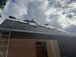 Once the old materials were cleared away, we applied new seals and underlayment to protect the home from moisture. After that, the new shingles were installed, creating a solid, updated roofing system designed to handle New England weather.