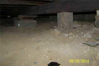 This Bronx, NY crawl space was damp and dirty and got wet after rains. The homeowner was losing money heating a drafty crawl space.
