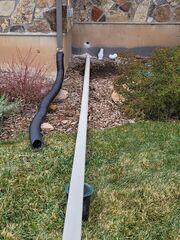 During Installation - IceGuard, Landscape Well, Exterior Discharge Line