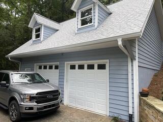 New gutters and downspouts