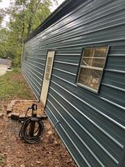 Checking the demensionas of the service garage and to know how much gutter