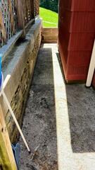 Eroding and Unlevel Concrete Sidewalk