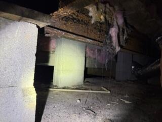 Moisture, mold and falling, failing insulation are problems in this crawl space, which hasn't been properly sealed. The encapsulation treatment totally separates and protects the crawl space interior from outdoor conditions, keeping the space clean and dry.