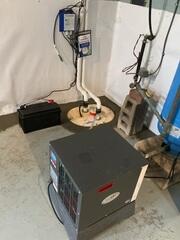 This photo shows our comprehensive waterproofing system that consists of our WaterGuard drainage, TripleSafe sump pump, CleanSpace vapor barrier, and Sedona dehumidifier. They work together to keep this basement dry and moisture-free.