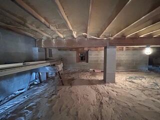 An LRE Design Specialist inspected the home's crawl space and identified an ideal opportunity to enhance protection against moisture damage by installing the CleanSpace moisture barrier.