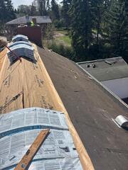 Shingles removed and decking replaced