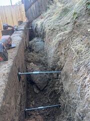 Timber Retaining Wall Stabilization with Manta Ray Earth Anchors