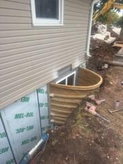 Side View of Window Well During Installation