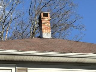Before: Three Tab Shingles & Shoddy Chimney Flashing