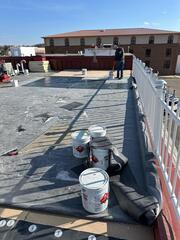 Removing old roof membrane