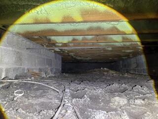 An inspection by the LRE Design Specialist revealed high moisture and humidity levels in the home's crawl space.