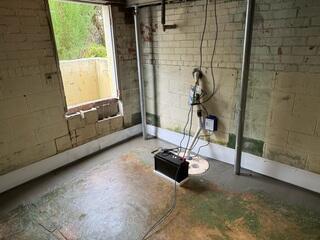 Sump Pump System Installed with Support Jacks - Basement Waterproofing Complete (Jacksonville, FL)