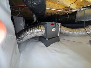 Sanidry Dehumidifier Installed for Year-Round Humidity Control