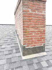 New Flashing Is Installed on the Chimney