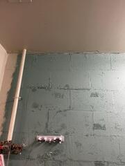 The cracks are visible through the wall, affecting the interior of the building.