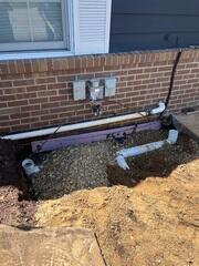 Exterior Drainage Line in Problem Zone Gathers Saturated Water
