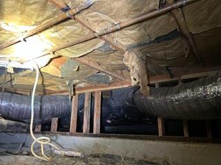 Before Instalation - Moldy, Crumbling Insulation