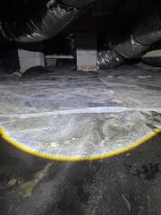 Exposed Crawl Space Ground Allowing Moisture to Rise into the Home