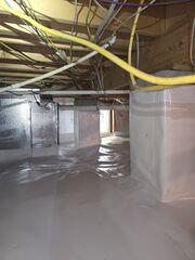 SilverGlo Insulation and Vapor Barrier Creating a Bright, Dry Crawl Space