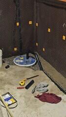 The pump and lid is installed and the discharge line is added.