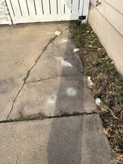 Cracked and Sinking Driveway Lifted with PolyLevel Injection Foam