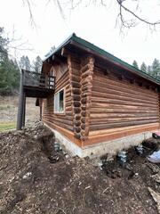 During Installation - Helical PIers Attached To The Home