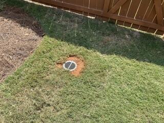 Downspout grat installed