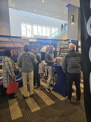 Sam and Ryan Talking To Home Show Visitors