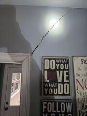 Slab Settlement Stabilized with Helical Piers