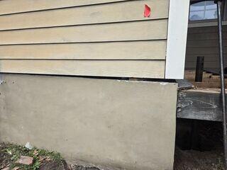 Slab Settlement Stabilized with Helical Piers