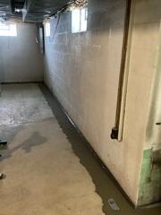 Damp and Humid Basement Has Effective Solution Installed in Webster, NY