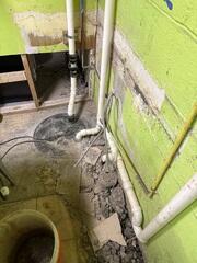 Original Sump and Water Damage Residue