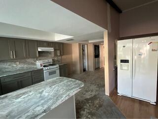 Water Damage Restoration in Plano TX - Flooring Removal in Kitchen