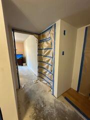 Hallway Water Damage Restoration in Plano, TX - Surface Protection and Wall Preparation