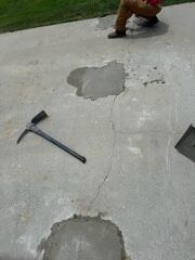 During Driveway Excavation Area for Pier Installation Being Backfilled