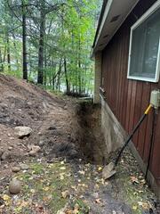 Trenching Along Foundation for Structural Correction