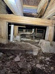 During the inspection of the home's crawl space, the LRE Design Specialist detected high humidity and moisture levels.