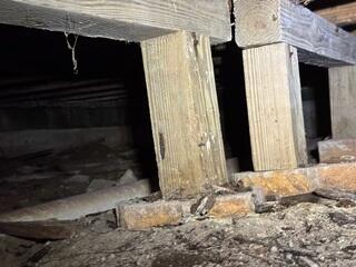 Settling Crawl Space Piers