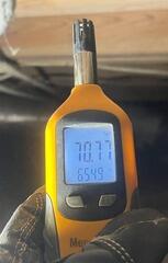 Checking Humidity Levels in the Crawl Space