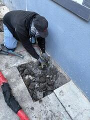 Technician Installing Push Pier System Thousand Oaks CA